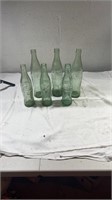6 antique glass coca-cola bottles