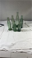 6 antique glass coca-cola bottles