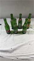 6 antique green soda bottles