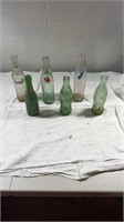 6 antique glass soda bottles