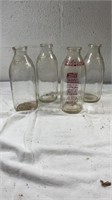 4 antique milk jars