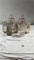 7 glass milk jars