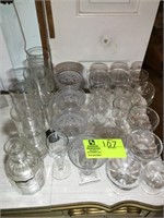 GROUP OF GLASSWARE ON RIGHT SIDE OF VANITY