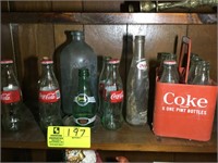 4TH SHELF LEFT SIDE CONTENTS WITH COCA COLA AND PE