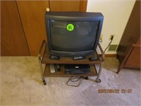 Admiral colored TV & stand- VHS player lot