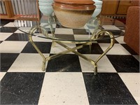 OVAL BRASS AND GLASS COFFEE TABLE-15" X 34"