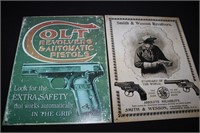 One Colt & One Smith & Wesson Metal Signs