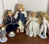 D2)  Dolls: Porcelain dolls - various with stands