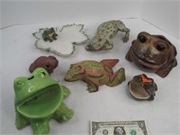 Lot of frogs.  middle one is wood