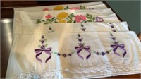 2) sets of embroidered pillow cases