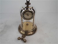 vintage clock with glass dome.  in good shape