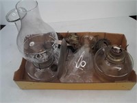 lot of oil lamps and parts