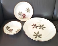 Stoneware serving bowls; flower images...