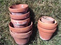 Lot of clay pots, some have cracks but
