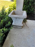2 concrete flower planters-both with bottom damage
