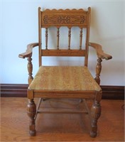 Oak carved back chair-upholstered seat
