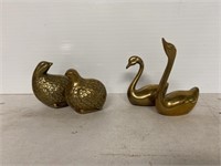 Bronze swans and goose