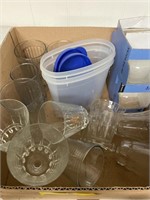 Box with wine glasses, glass cups, plastic