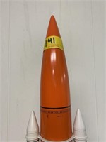 White and orange Rocket with 6 missiles on the