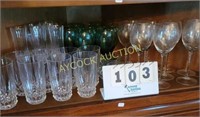Shelf full of glassware -