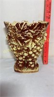 Mccoy pottery grape cluster vase does have chip