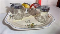 Vintage platter with syrup pitchers