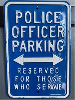Embossed metal police officer parking sign