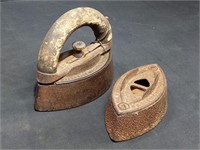 Pair of antique cast iron sad irons