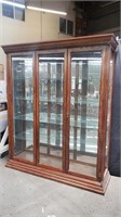 Large oak and glass lighted display cabinet