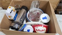 Box of kitchen items, including decorative bowls