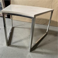 Marble-top table on chrome base