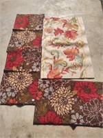 4 flower rugs, 3 are matching kitchen rugs