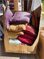 huge box full of throw pillows