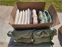 box full of chair cushions