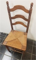 Ladder back chair with rattan woven bottom...