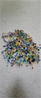 Large quantity glass marbles and steelies