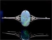 Black opal and 18ct white gold brooch