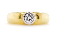 Bezel set solitaire diamond & 18ct yellow gold