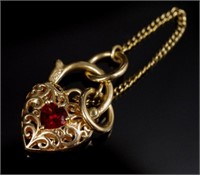 Garnet set 9ct yellow gold heart padlock clasp.