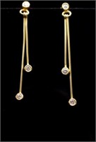 18ct yellow gold set dangling diamond earrings