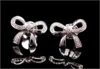 Diamond set 18ct white gold "bow" stud earrings