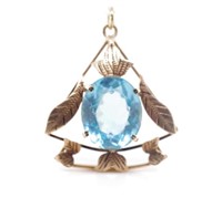 Arts & crafts blue glass & 9ct rose gold pendant