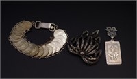Silver coin bracelet, marcasite brooch and pendant