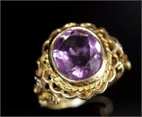 Amethyst and 9ct yellow gold fret work ring