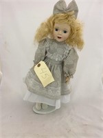 Porcelain Doll with Stand