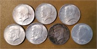 Lot of 7 1964 Kennedy Half Dollars