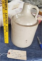 antique stoneware whiskey jug marked WH Adams