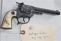 Antique toy cap gun Hubley RODEO w Longhorn grips