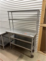 Stainless Steel Table W/ (4) Shelves On Castors
