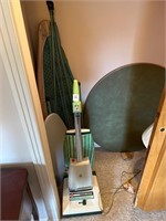 Vacuum, iron boards and card table